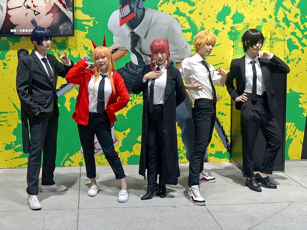 Cosplay of the five main Chainsaw Man characters (Aki, Power, Makima, Denji, Himeno) at a 2022 event